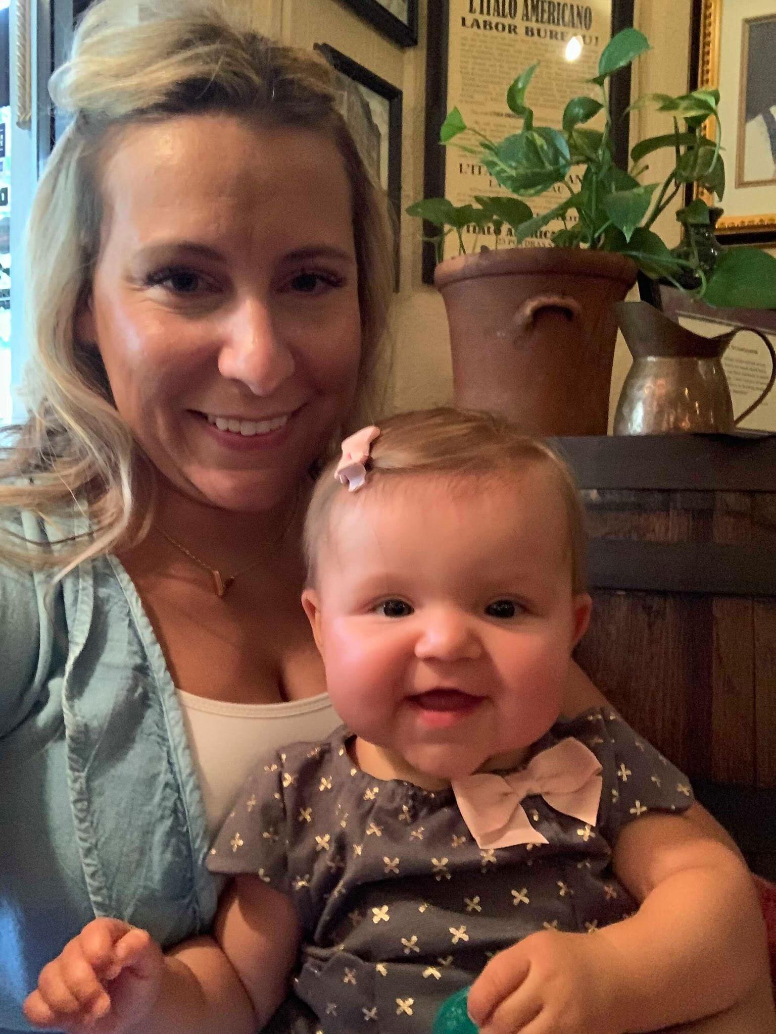 kaity smiles with her daughter